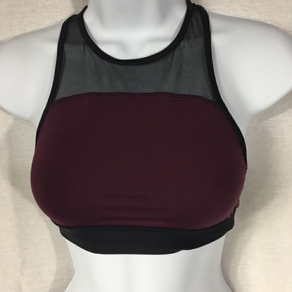 Pink brand XS purple wine colored body with black trim around Razorback back